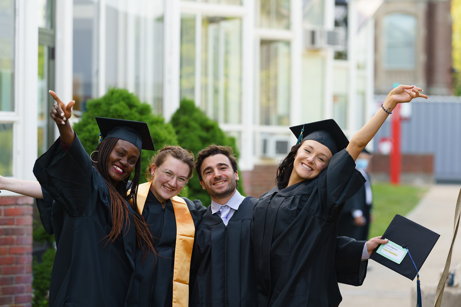 Four Graduates at Commencement 