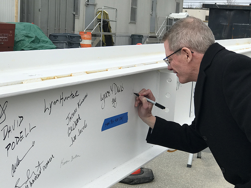 Dave Bennet Signing the Beam