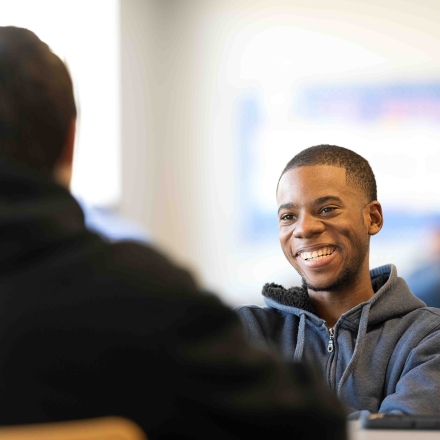 Smiling student in the caf